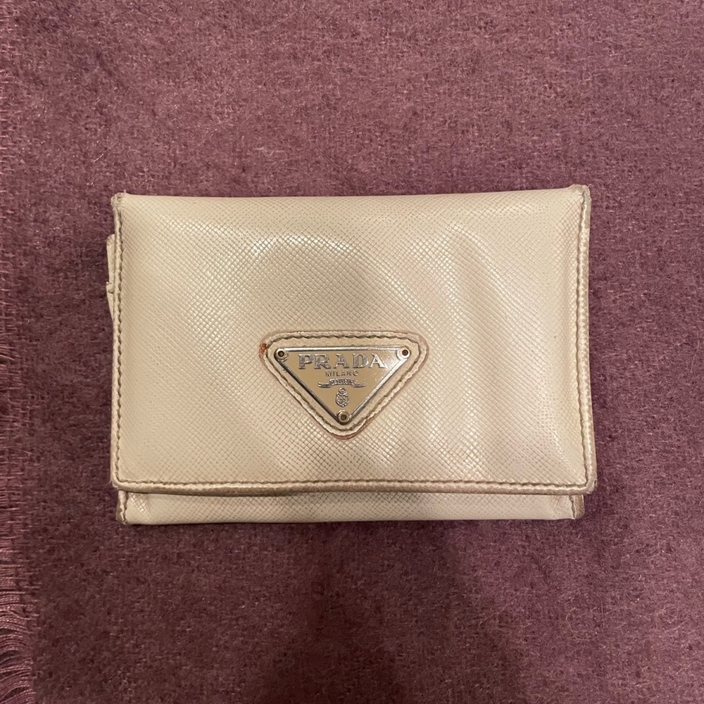 Pre-loved small beige cream Leather Prada wallet